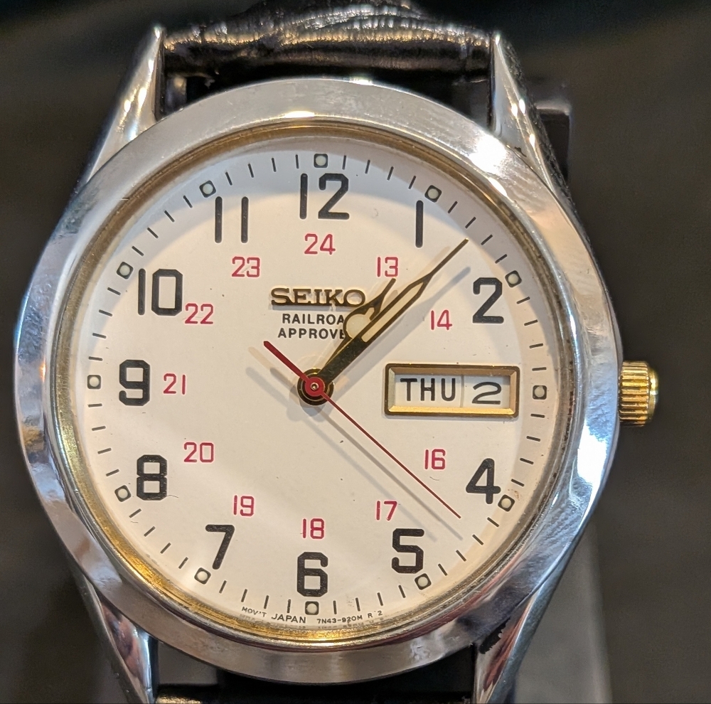 Seiko Silver and Black Watch with White Dial